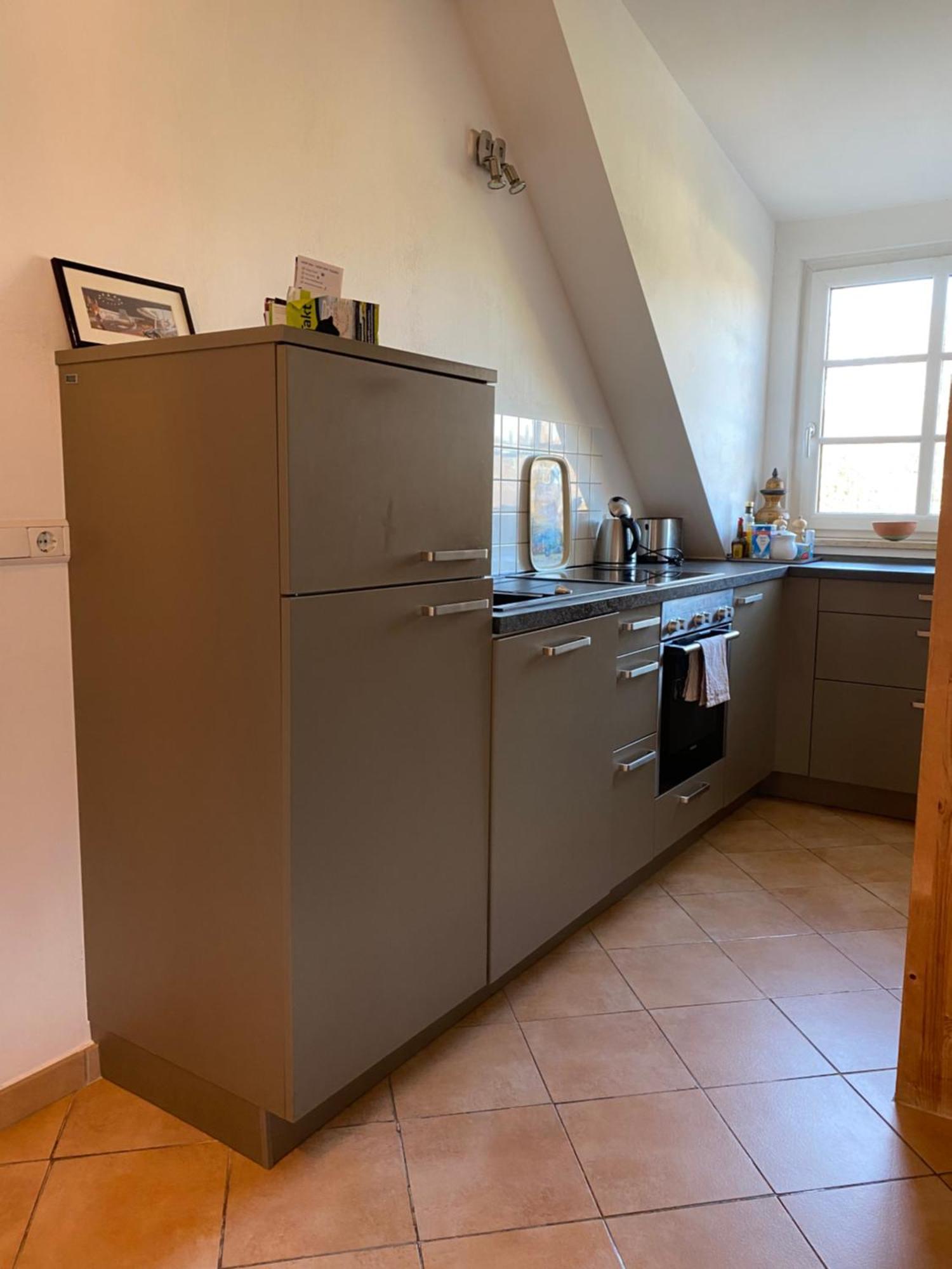Helle Und Ruhige Dachgeschosswohnung München Kültér fotó